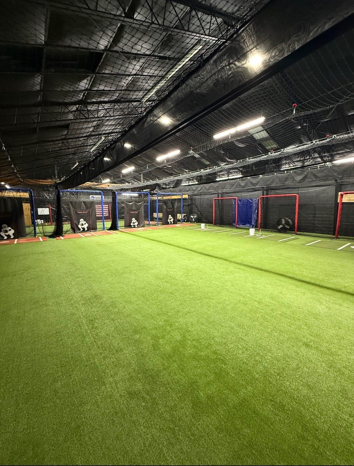 Open turf floor with the tunnels in the background